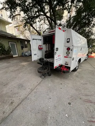 Magnet Plumbing service vehicle on-site for Water Heater Repair in East Lake